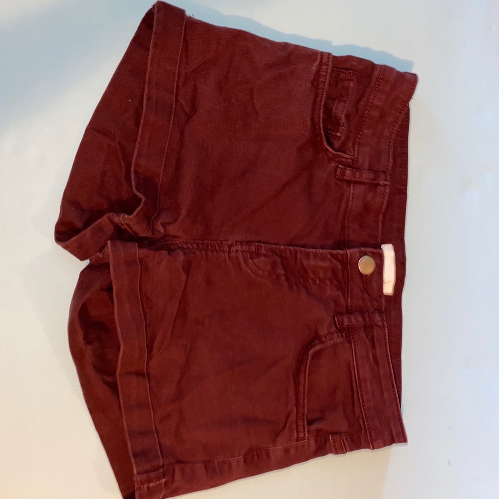 Maroon Jean shorts.